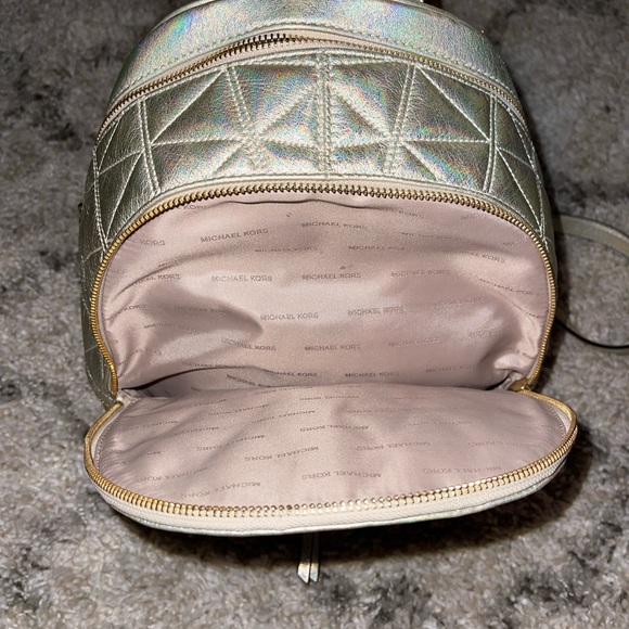 Michael Kors metallic gold backpack and wristlet/wallet display picture 2